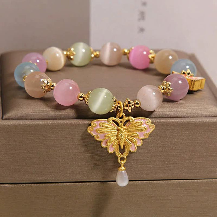 Buddha Stones Mehrfarbiges Perlenarmband mit Katzenaugen-Schmetterling und Liebesmotiv - image 1