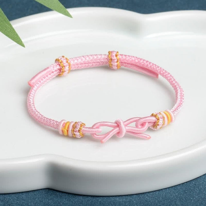 Buddha Stones Handgewebtes Armband „Schmetterling Glück“ mit verstellbarer geflochtener Kordel - Rosa - Roter Faden (Schutz♥Glück) - image 1