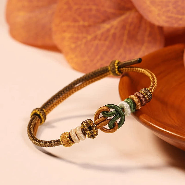 Buddha Stones Handgewebtes Armband „Prosperous Universe“ aus mehrfarbiger Kordel - Goldrute - Roter Faden (Schutz♥Glück) - image 1