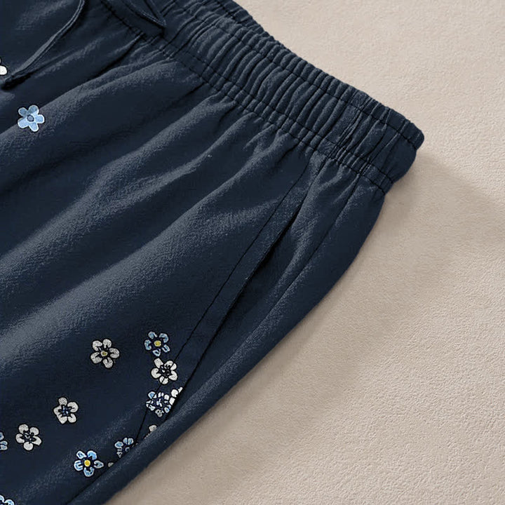 Buddha Stones Weiße, schmal zulaufende Herrenhose aus Baumwolle mit floralem Wolkenmuster und Taschen - image 2