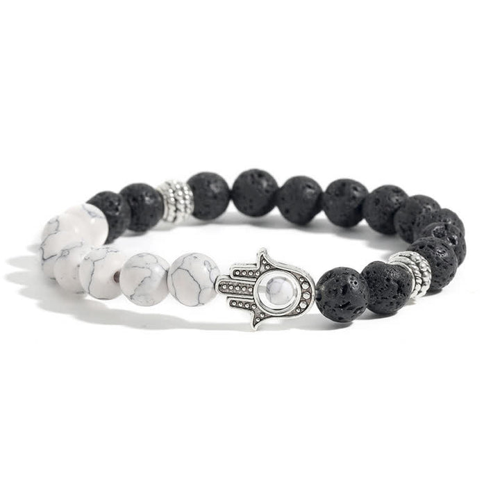 Buddha Stones Handgefertigtes rundes Armband aus Lavastein mit Hamsa-Handflächenmotiv zum Schutz der Handfläche - Türkis & Lavagestein - image 1