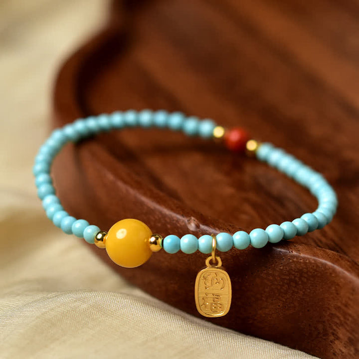 Buddha Stones Handgefertigtes Perlenarmband mit türkisfarbenem Fu-Symbol und Glücksbringer - image 2