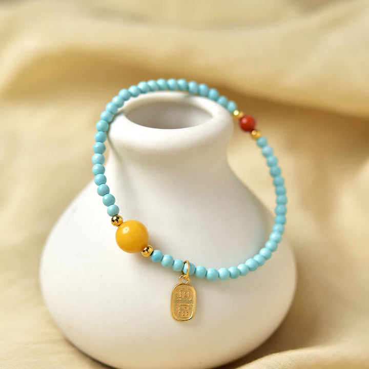 Buddha Stones Handgefertigtes Perlenarmband mit türkisfarbenem Fu-Symbol und Glücksbringer - image 4