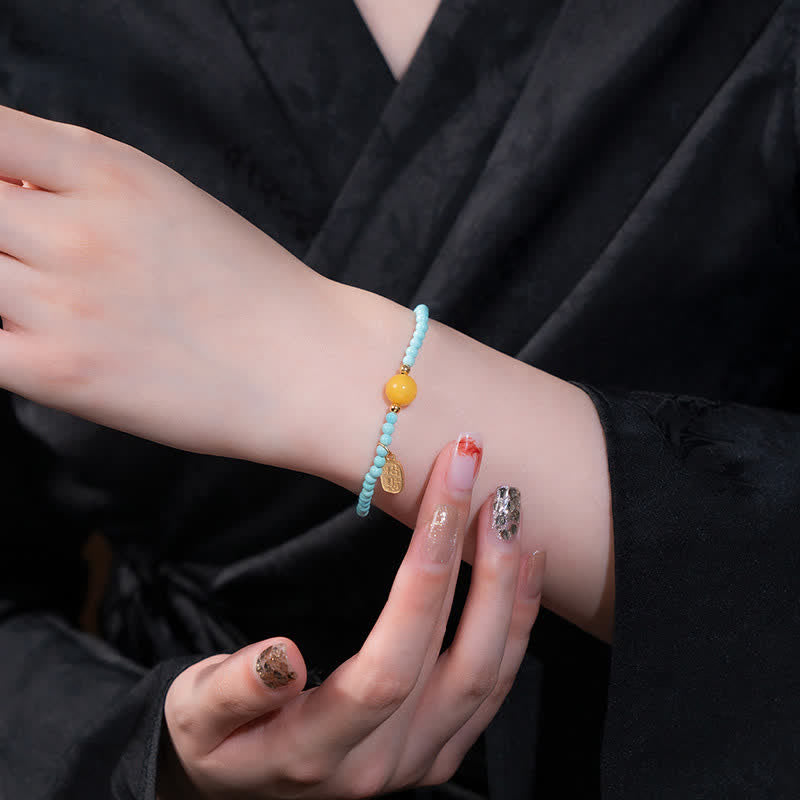 Buddha Stones Handgefertigtes Perlenarmband mit türkisfarbenem Fu-Symbol und Glücksbringer - image 9
