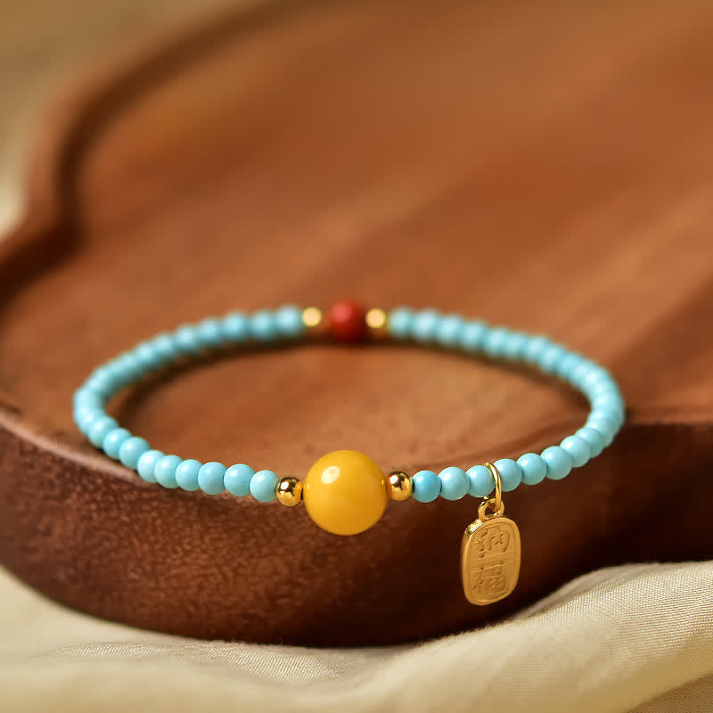 Buddha Stones Handgefertigtes Perlenarmband mit türkisfarbenem Fu-Symbol und Glücksbringer - Türkis (Reinigung ♥ Gelassenheit) - image 0
