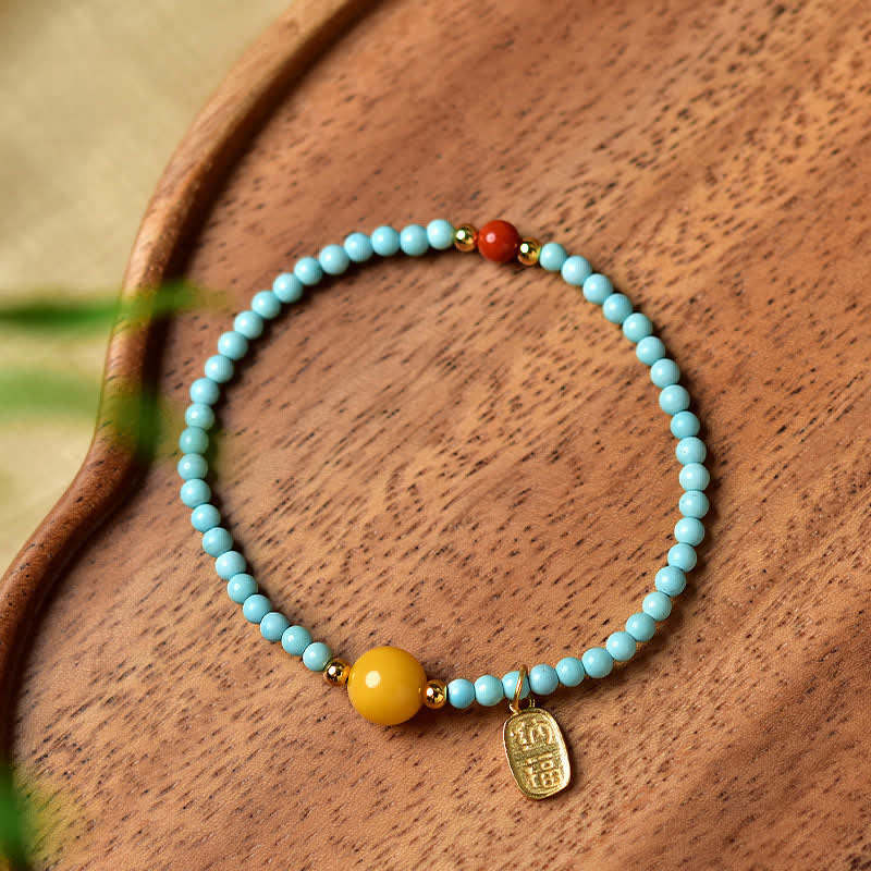 Buddha Stones Handgefertigtes Perlenarmband mit türkisfarbenem Fu-Symbol und Glücksbringer - image 1