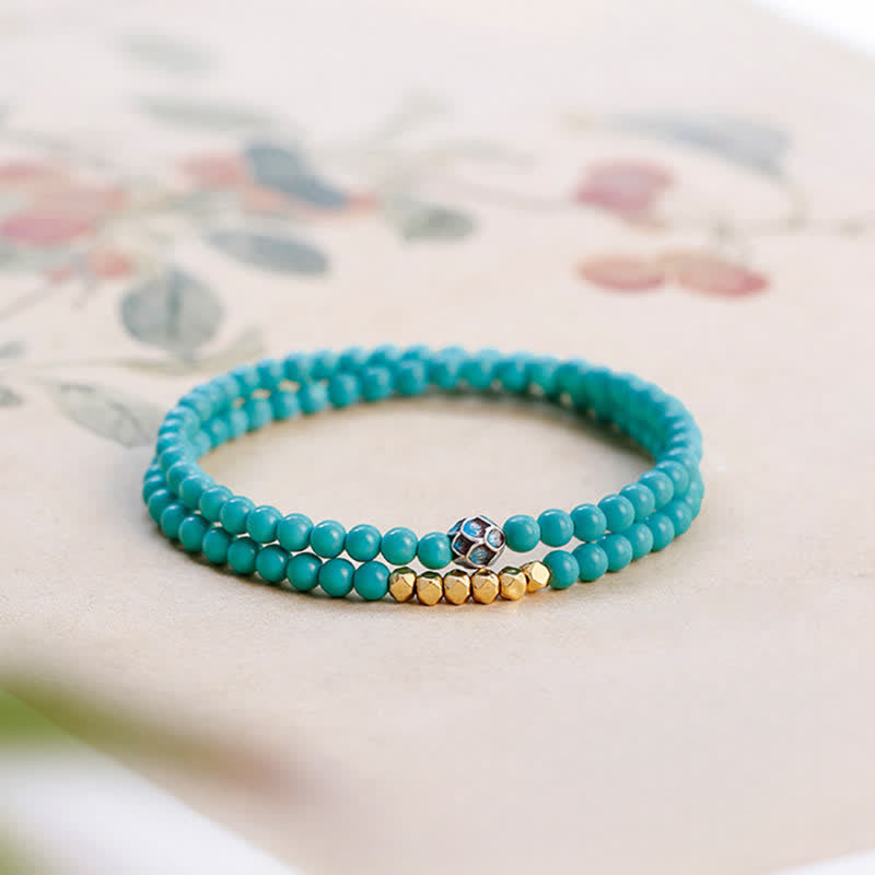 Buddha Stones Türkisfarbenes, handgefertigtes Armband mit doppelt gewickelten, facettierten Perlen - Türkis (Schutz ♥ Kommunikation) - image 0