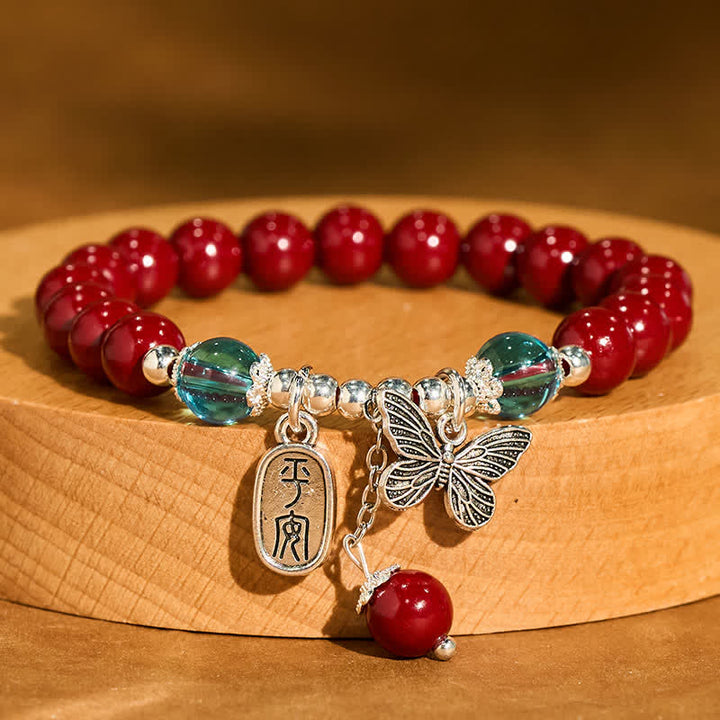 Buddha Stones Armband aus Zinnoberkupfer mit Schmetterlingsmotiv - Zinnober (Handgelenkumfang: 15–16 cm) - image 0