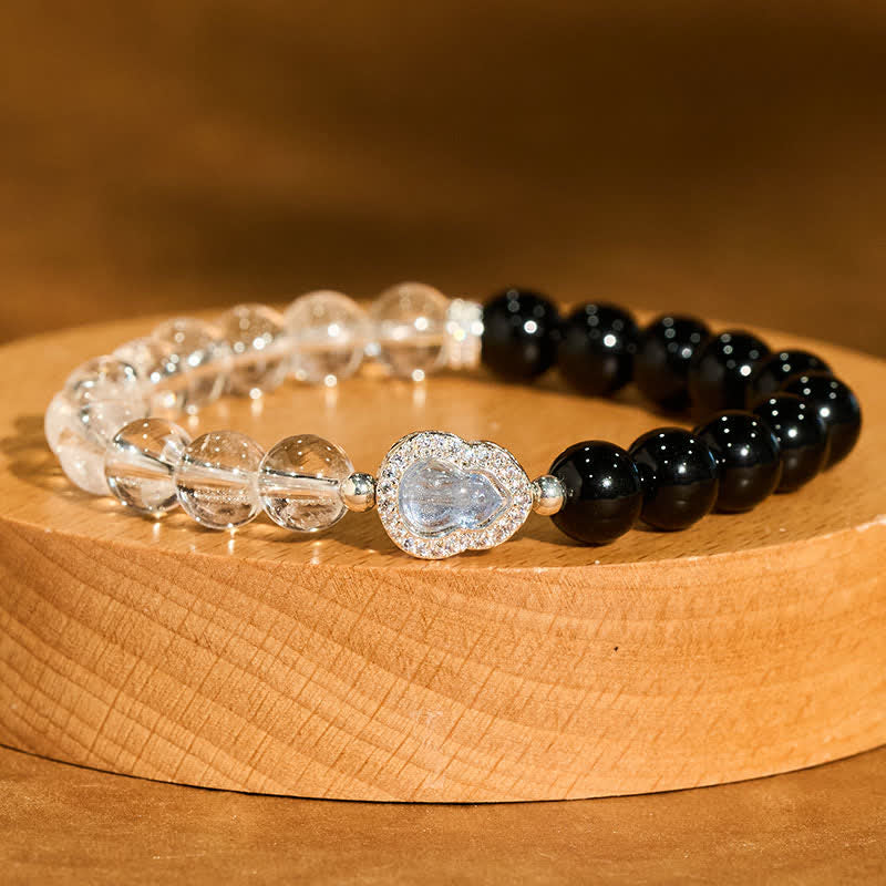 Buddha Stones Klares Quarz-Armband aus schwarzem Obsidian und Kürbis - image 1
