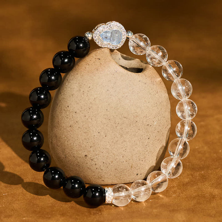 Buddha Stones Klares Quarz-Armband aus schwarzem Obsidian und Kürbis - Klarer Quarz, schwarzer Obsidian (Handgelenkumfang: 15–16 cm) - image 0