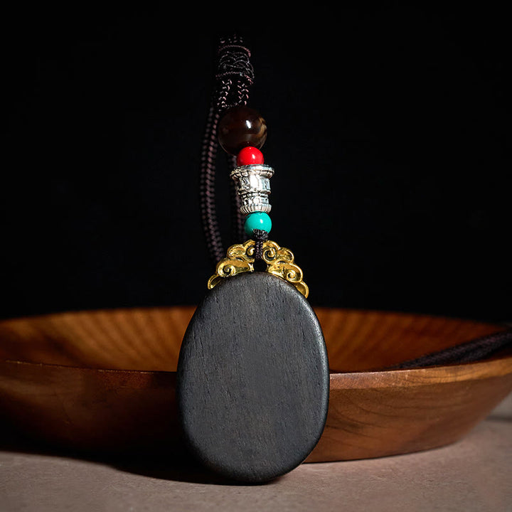 Buddha Stones Handgefertigte ovale Halskette aus Ebenholz mit dem Motiv „Weisheit“ im Stammesstil - image 2