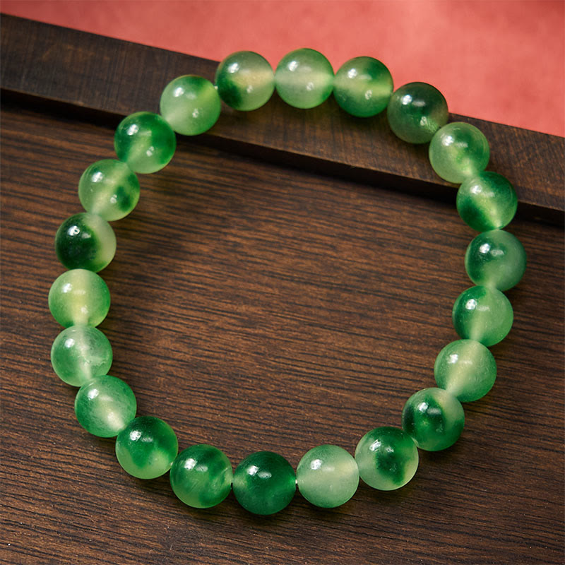 Buddha Stones Armband aus weißen Chalcedon-Perlen mit heilender grüner, schwebender Blume - image 2