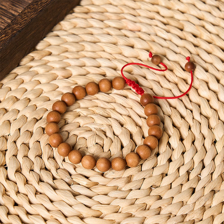 Buddha Stones Erdendes Sandelholz-Armband aus tibetischen Sandelholzperlen - image 1