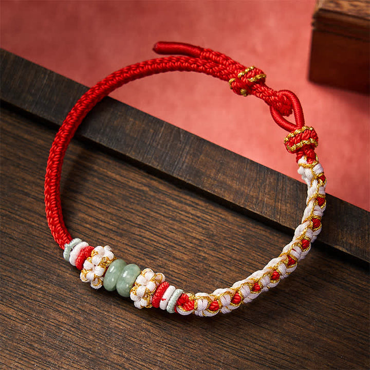 Buddha Stones Handgefertigtes, geflochtenes Armband mit Pfirsichblüten und Jade in chinesischer Knotentechnik, verstellbar. - Rot - 15-20 cm - image 0