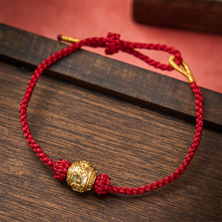 Buddha Stones Handgewebtes Armband aus rotem Garn mit dem Aufdruck „Om Mani Padme Hum“, verstellbar zum Selbermachen - Dunkelrot (Handgelenkumfang 15-20 cm) - image 0