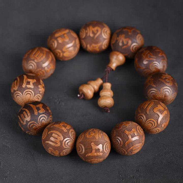 Buddha Stones Armband aus natürlichem Abelia Biflora-Holz mit Herz-Sutra Om Mani Padme Hum - Om Mani Padme Hum - image 0