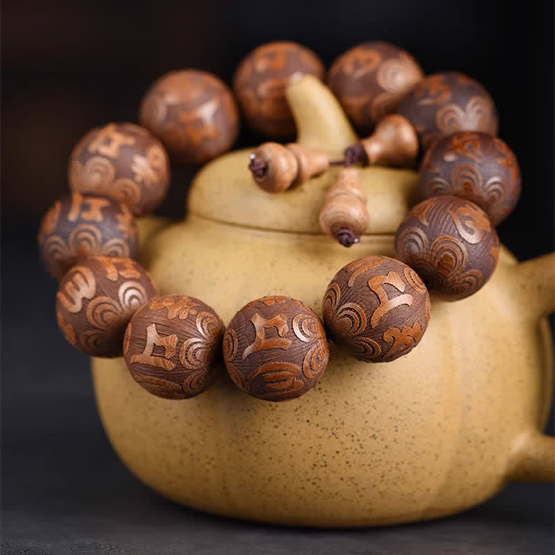 Buddha Stones Armband aus natürlichem Abelia Biflora-Holz mit Herz-Sutra Om Mani Padme Hum - image 1