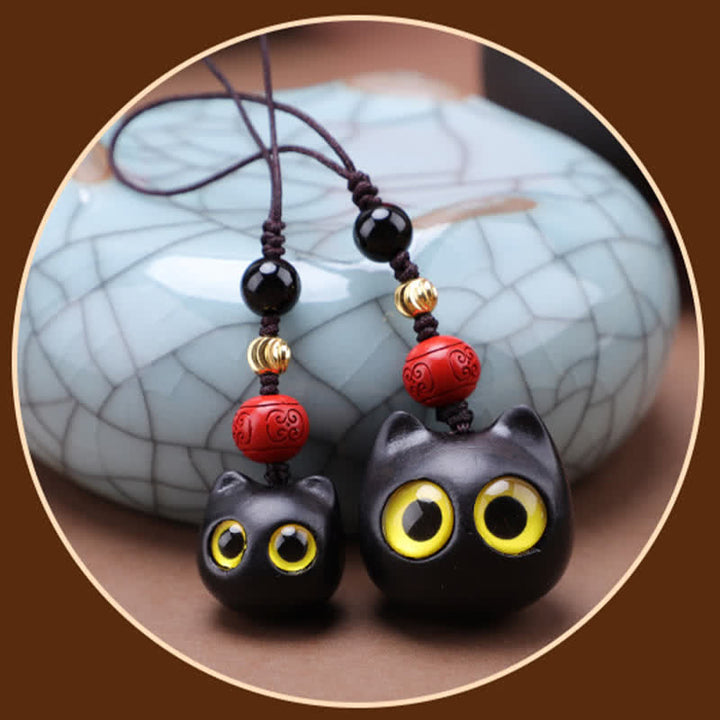 Buddha Stones Niedliche, handgeschnitzte Schlüsselanhänger aus Ebenholz mit Katzenmotiv – ein Symbol für Frieden und Erdung. - image 18