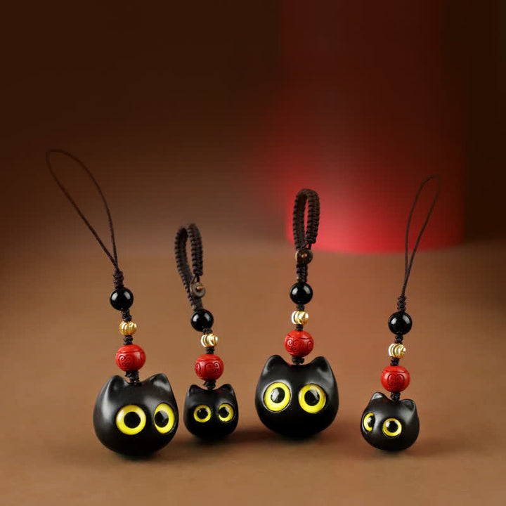 Buddha Stones Niedliche, handgeschnitzte Schlüsselanhänger aus Ebenholz mit Katzenmotiv – ein Symbol für Frieden und Erdung. - image 19