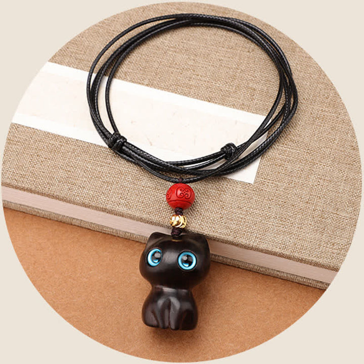 Buddha Stones Halskette aus Ebenholz, rotem Sandelholz und niedlichem Katzenmotiv - image 3