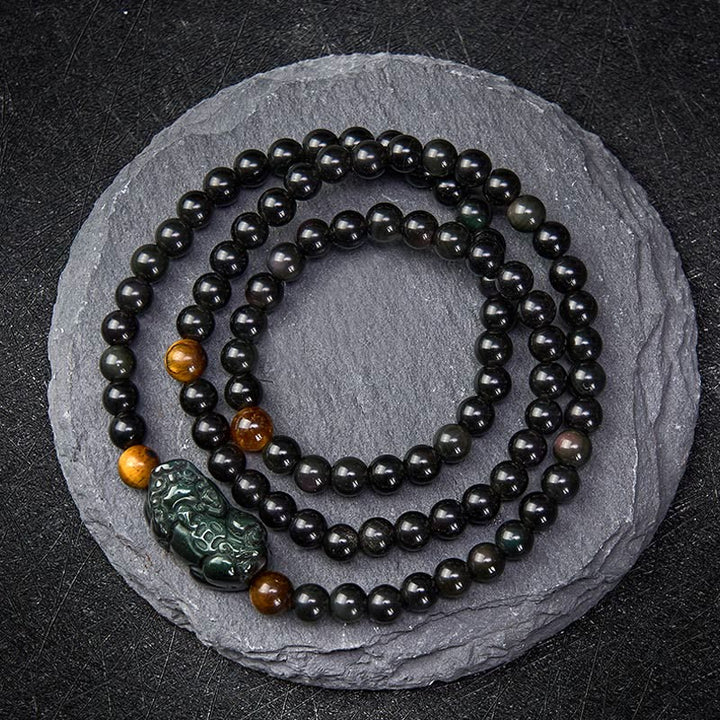 Buddha Stones PiXiu Regenbogen Obsidian Schwarzes Obsidian Reichtum Handgeschnitztes Perlenarmband - Regenbogen-Obsidianperle (Farbwechsel im Licht) - 6 mm - image 0