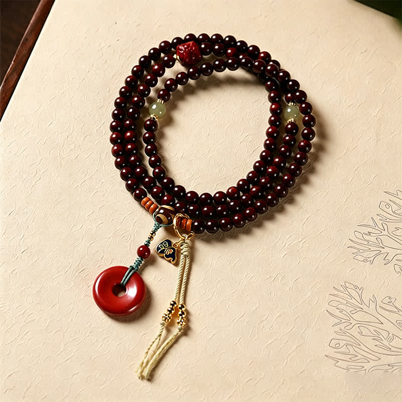 Buddha Stones Friedensschnalle aus rotem Sandelholz, handgewebte Mala mit 108 Perlen - Rotes Rosenholz (Erdende Energie ♥ Innere Stärke) - image 0