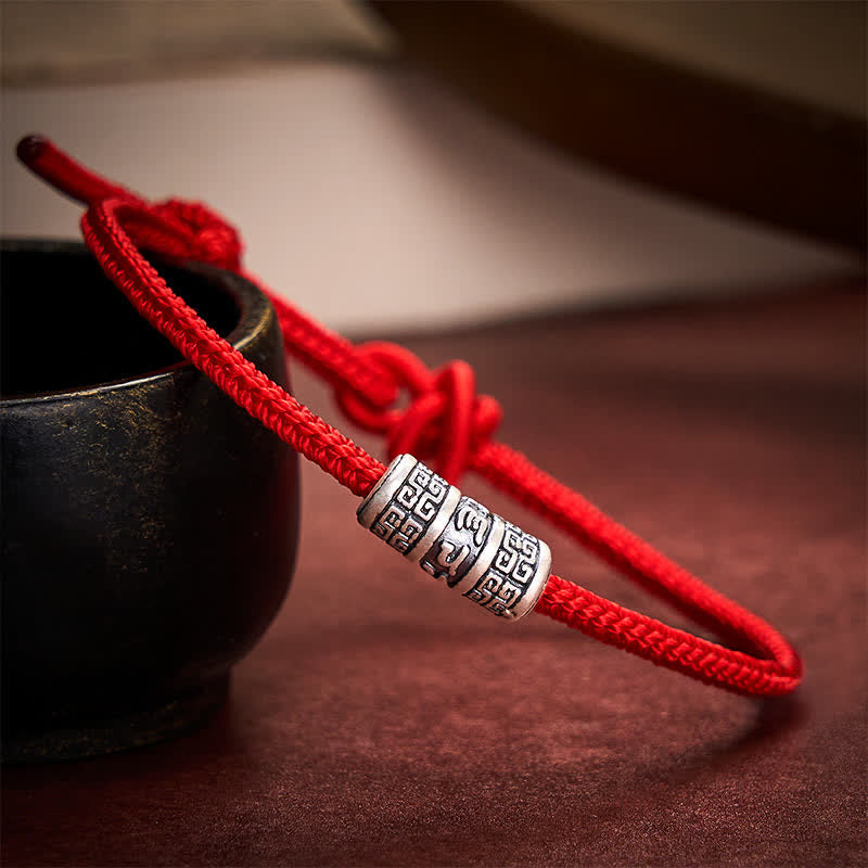 Buddha Stones Handgefertigtes geflochtenes Armband aus roter Schnur mit Om-Mani-Padmé- und Hum-Symbolen zum Schutz - image 1