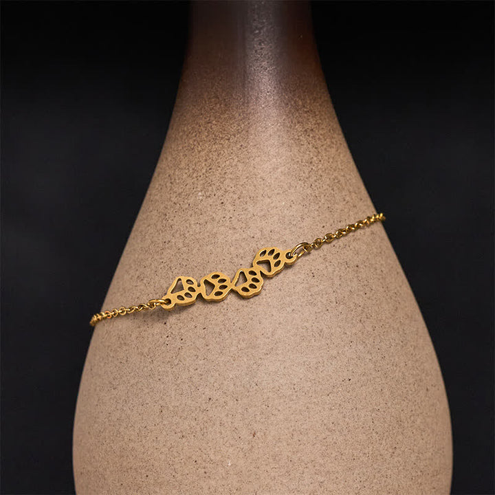 Buddha Stones Balance-Armband aus Titanstahl mit vier Katzenpfoten - Golden (Handgelenkumfang: 17–22 cm) - image 0