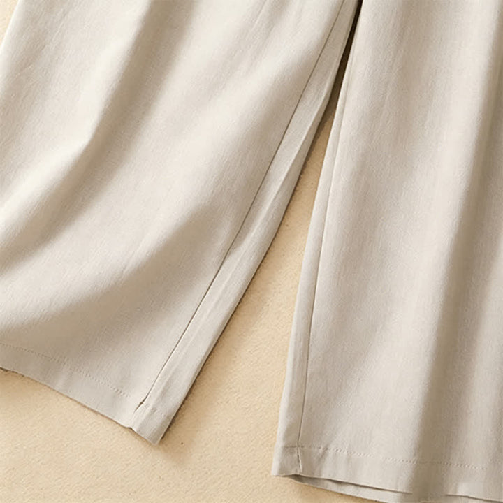 Buddha Stones Lässige, minimalistische Sommerhose aus Unifarben mit Knöchellänge, geradem Bein und Taschen, mit einem Froschknopf - image 17
