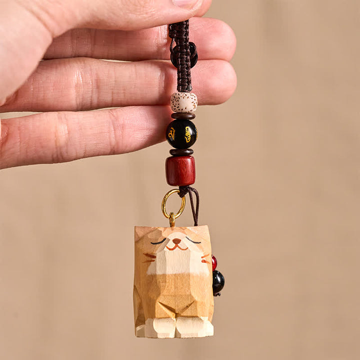 Buddha Stones Handgeschnitzte Schlüsselanhänger aus Holz mit Katzenmotiven und dem Schriftzug „Om Mani Padme Hum Peace“ - image 4
