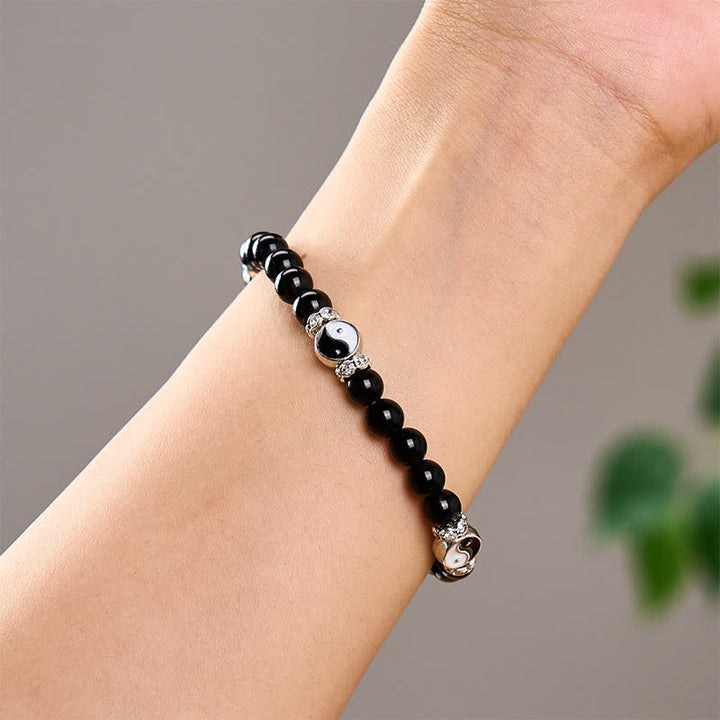 Buddha Stones Schwarzes Obsidian-Armband mit Yin-Yang-Symbol und rundem Anhänger - image 10