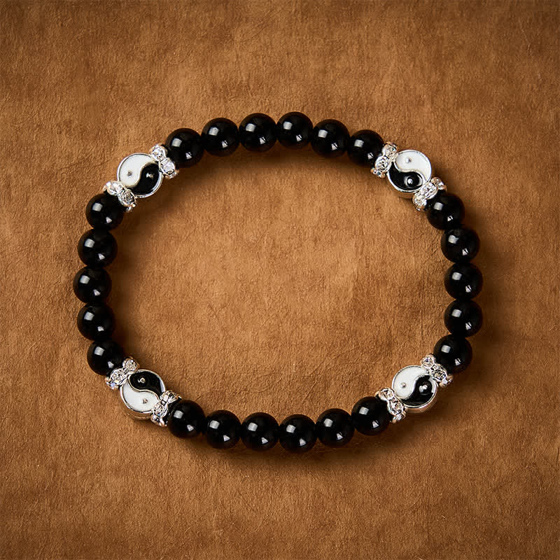 Buddha Stones Schwarzes Obsidian-Armband mit Yin-Yang-Symbol und rundem Anhänger - image 1