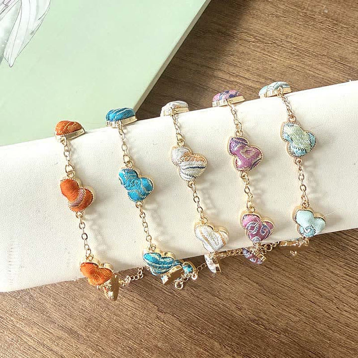 Buddha Stones Armband aus Brokat, Kupferkürbis und Goldton mit Segensmotiv - image 5