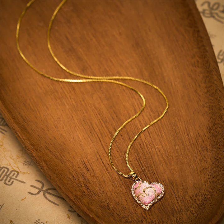 Buddha Stones Halskette aus Kupfer mit drehbarem Herz und vierblättrigem Kleeblatt, eingelegt in rosa Brokat, mit harmonischer Verbindung - image 11