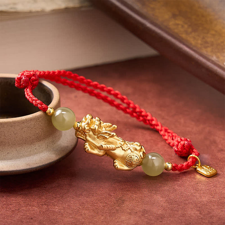 Buddha Stones Kupferarmband mit Pi-Xiu-Fu-Motiv und rotem Faden - image 1