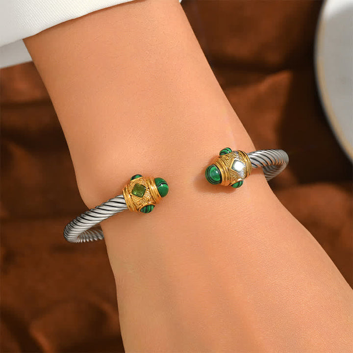 Buddha Stones Zweifarbiges Armband aus Edelstahl mit Spiralmotiv - image 1