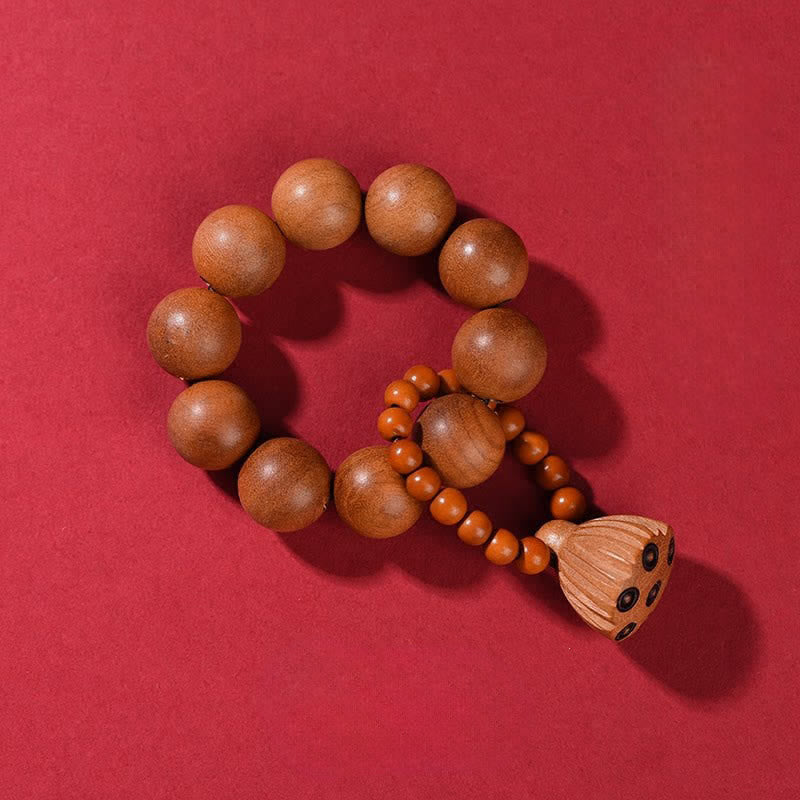 Buddha Stones Handpolierte, taktile Meditationsperlen aus Pfirsichholz in Form von Lotusblüten zur Erdung - Pfirsichholz (Schutz ♥ Reinigung) - image 1