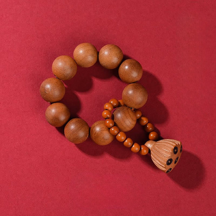 Buddha Stones Handpolierte, taktile Meditationsperlen aus Pfirsichholz in Form von Lotusblüten zur Erdung - Pfirsichholz (Schutz ♥ Reinigung) - image 1