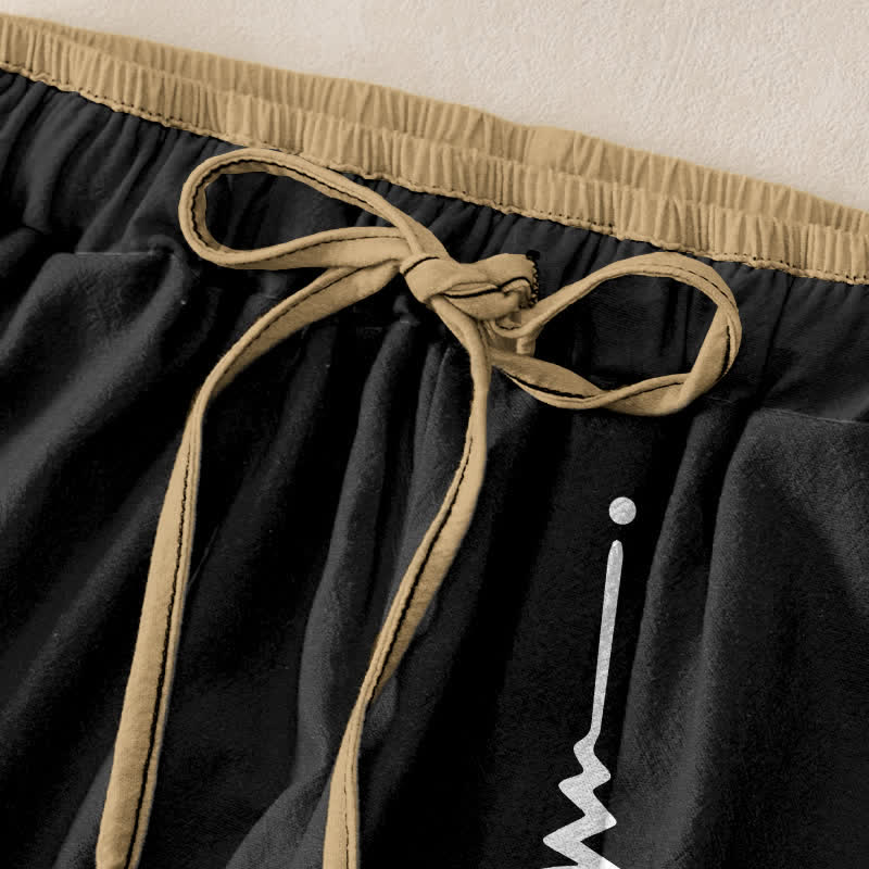 Buddha Stones Damenhose aus reiner Baumwolle mit Om-Symbolmuster, elastischem Bund und Taschen - image 1