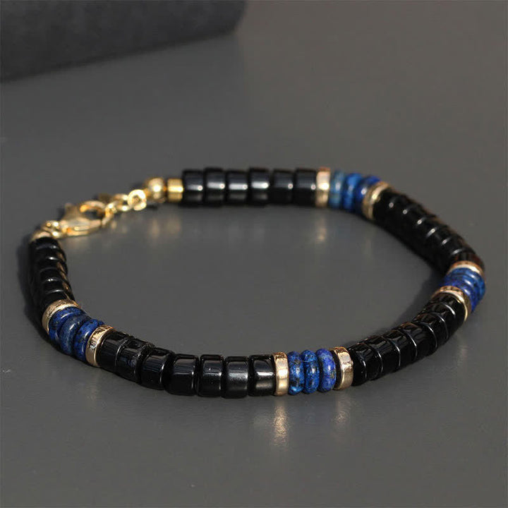Buddha Stones Armband aus Lapislazuli- und Onyxperlen mit Wahrheitswürfel-Motiv - image 1