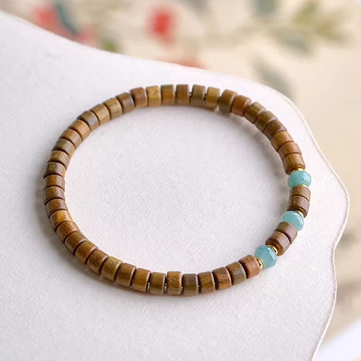 Buddha Stones Armband aus grünem Sandelholz, Serenity Jade und Fassperlen - image 1