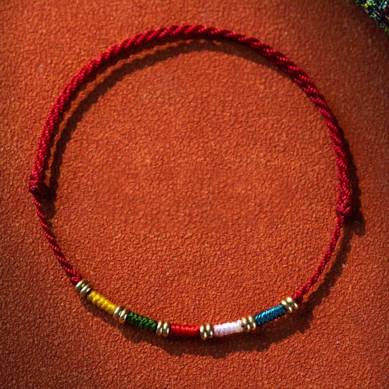 Buddha Stones Handgewebtes, farbenfrohes, rotes, tibetisches Schutzarmband mit verstellbarer Länge - Mehrfarbig (Handgelenkumfang: 14–17 cm) - image 0