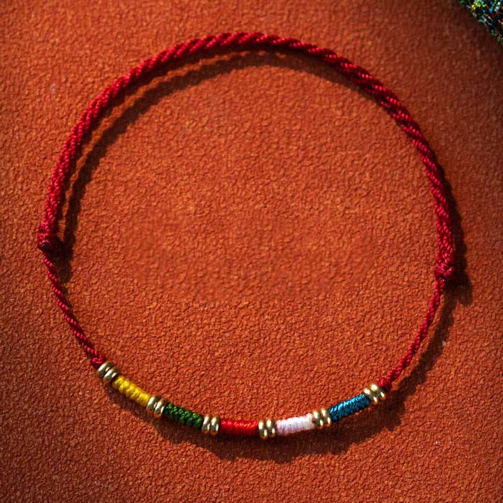 Buddha Stones Handgewebtes, farbenfrohes, rotes, tibetisches Schutzarmband mit verstellbarer Länge - Mehrfarbig (Handgelenkumfang: 14–17 cm) - image 0