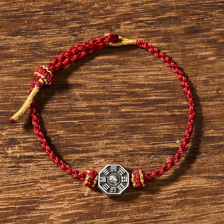 Buddha Stones Handgewebtes, verstellbares Armband aus roter Schnur mit Bagua-Schutzmotiv - image 1