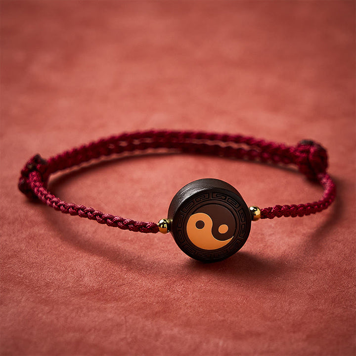 Buddha Stones Armband aus Ebenholz mit Bagua-Symbol und roter Schnur - image 2