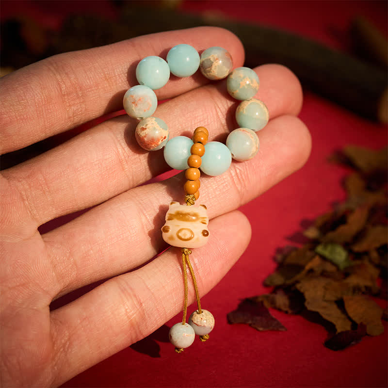 Buddha Stones Shoushan-Stein, mit Holzkohle gegrillte Katzenglücksperlen, taktile Meditationsdekorationen - 10 mm - Shoushan-Stein (Positive ♥ Harmonie) - image 1