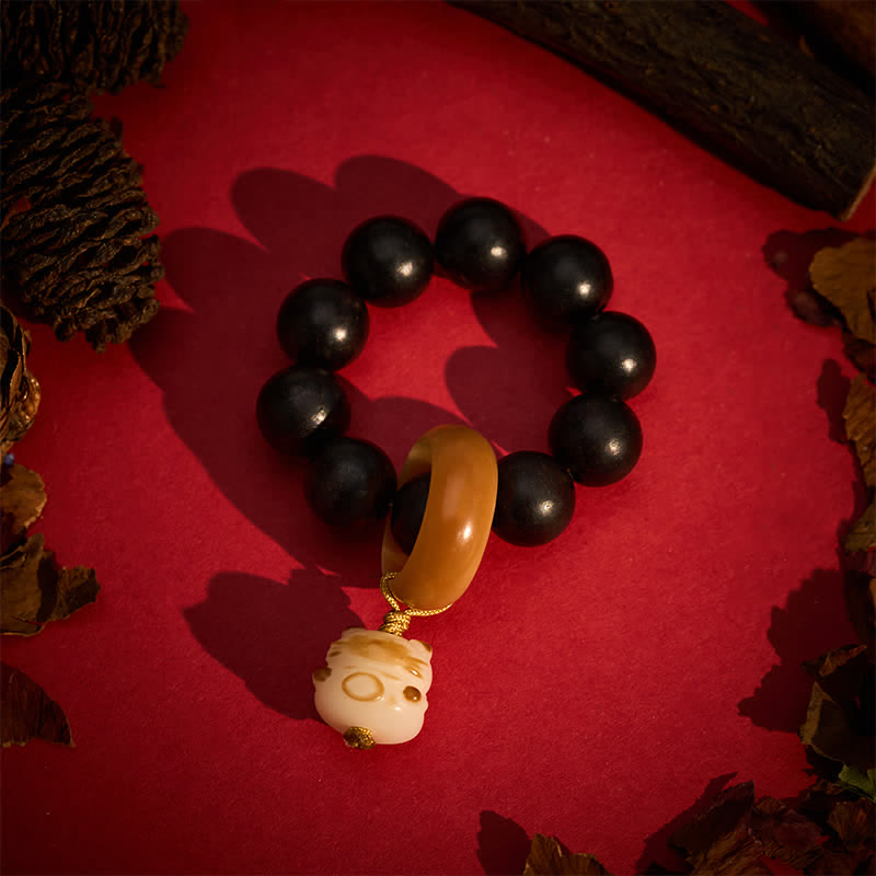 Buddha Stones Dekoration aus Ebenholz, gegrillt mit Holzkohle, Katze & Bär – Taktile Meditationsperlen zur Balance - image 1