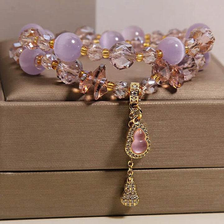 Buddha Stones Doppellagiges Perlenarmband mit Katzenaugenkürbis-Anhänger - image 11