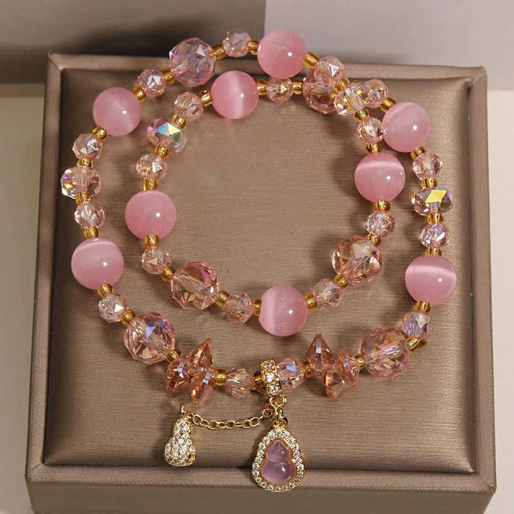 Buddha Stones Doppellagiges Perlenarmband mit Katzenaugenkürbis-Anhänger - image 1