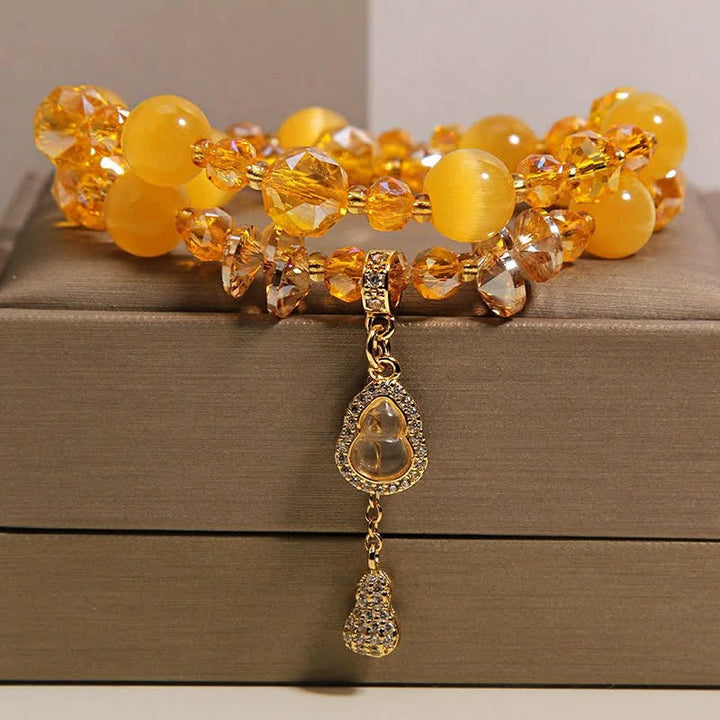 Buddha Stones Doppellagiges Perlenarmband mit Katzenaugenkürbis-Anhänger - image 6